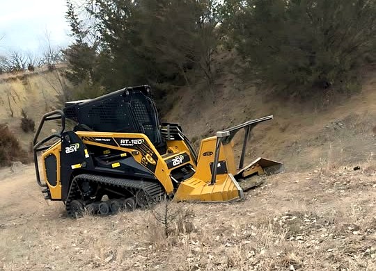 ASV tracked loader with a forestry mulcher on a hillside job